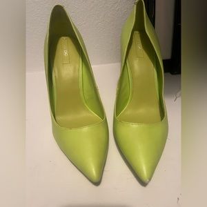 Neon green aldo shoes.